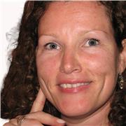 A qualified, highly-experienced, entertaining and encouraging teacher.